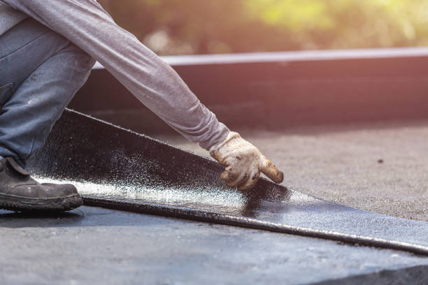 Professional Basement Waterproofing technician working in Woodburn, IN